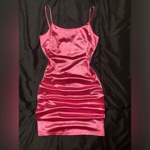 Silky pink dress perfect for homecoming or any formal occasion.